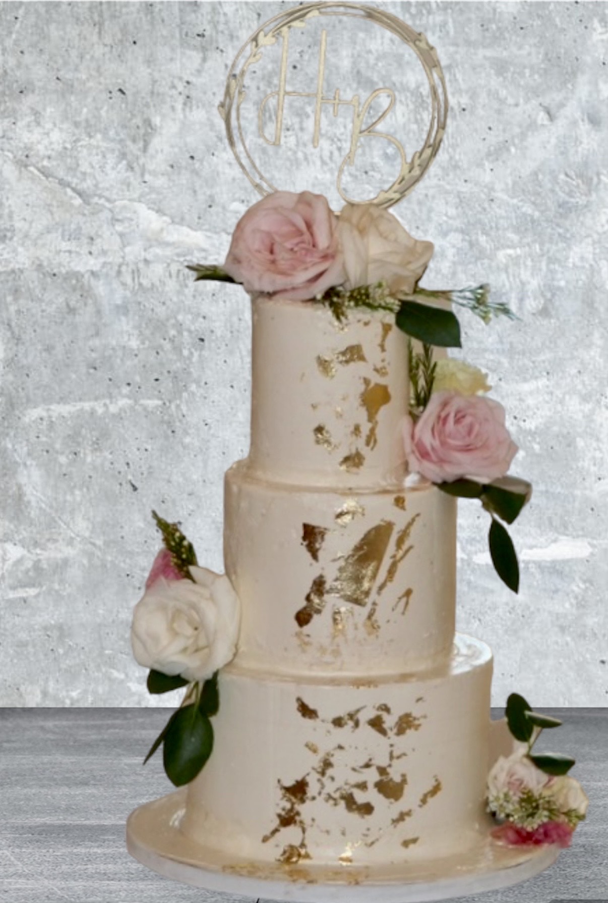 Buttercream wedding cake with gold leaf fresh flowers limerick