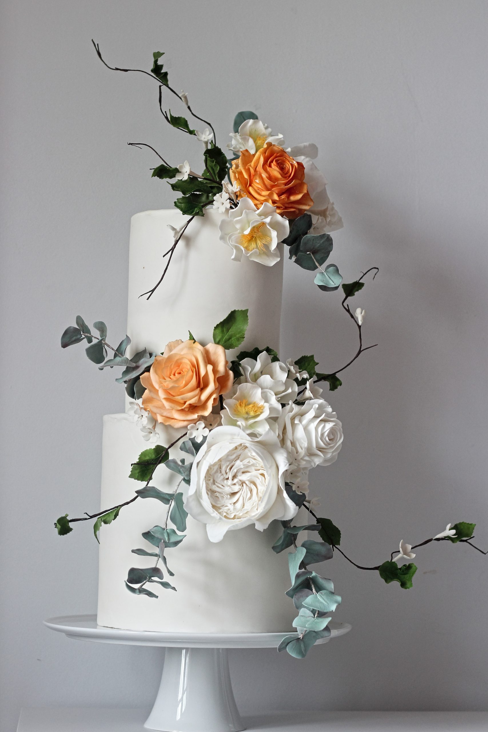 Fondant wedding cake with topper tipperary