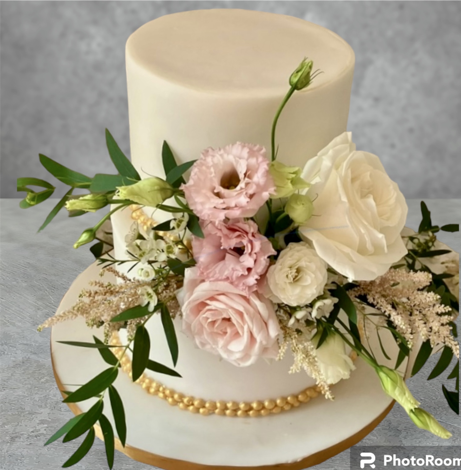 Fondant wedding cake with fresh flowers limerick